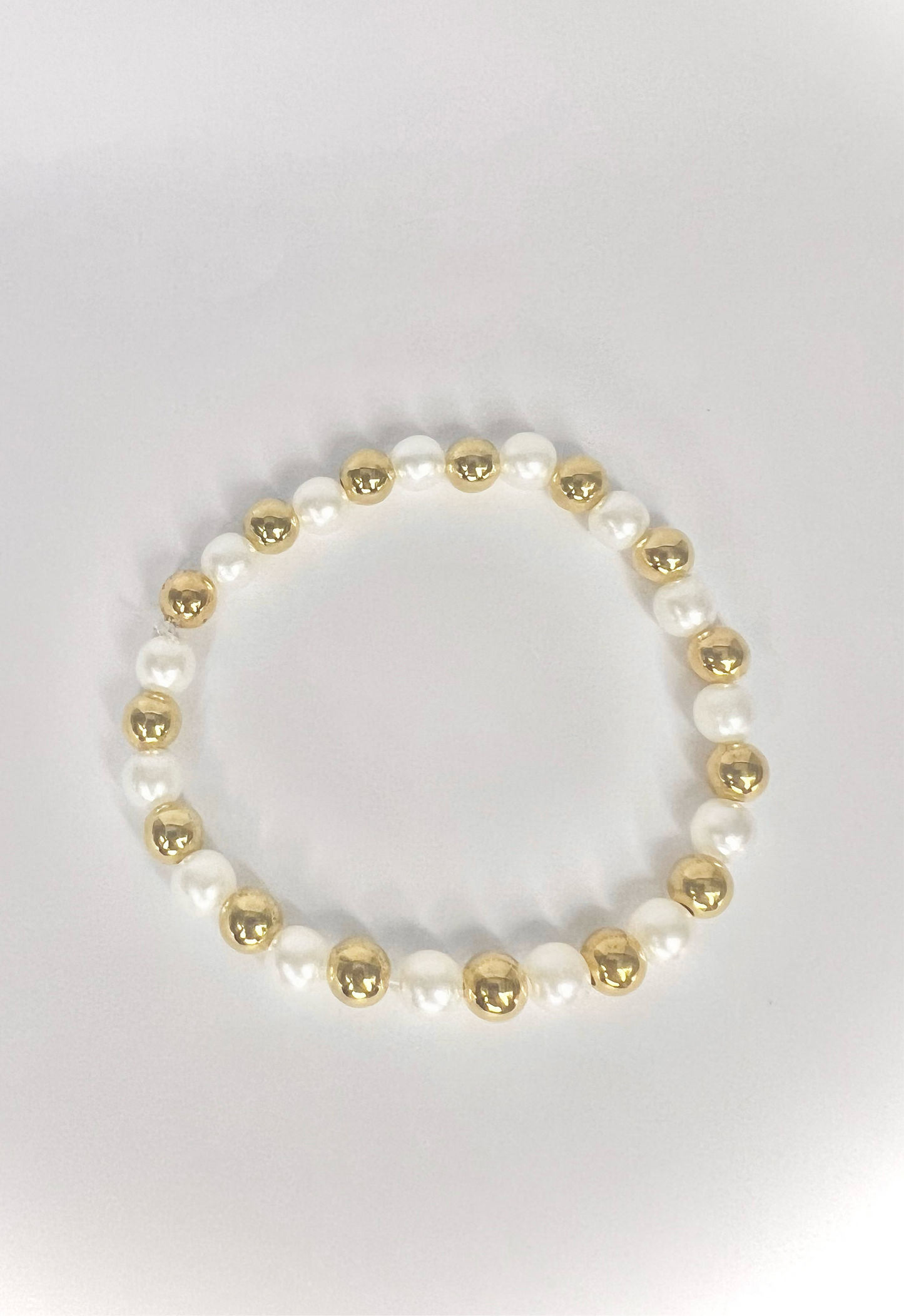 Gold and white pearls